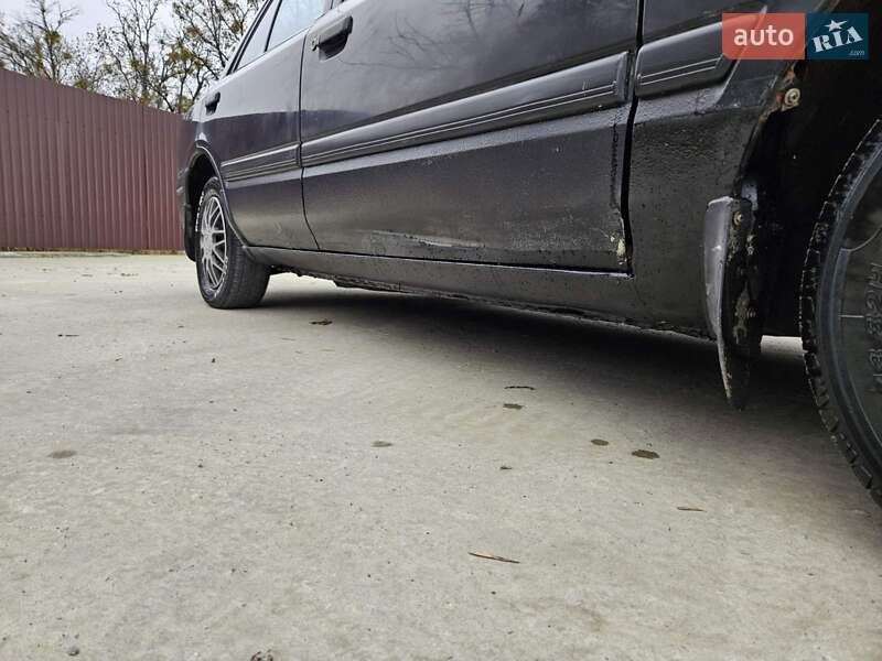 Седан Mazda 323 1995 в Обухове фото 17 Седан Mazda 323 1995 в Обухове