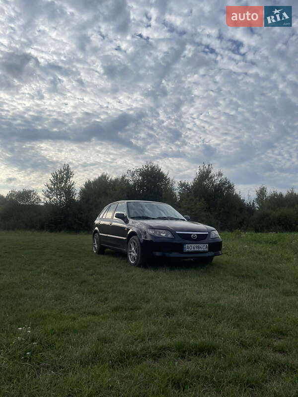 Хетчбек Mazda 323 2003 в Ужгороді фото 2 Хетчбек Mazda 323 2003 в Ужгороді