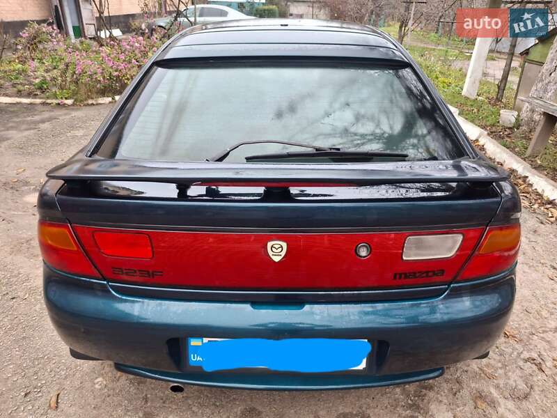 Седан Mazda 323 1996 в Хмельницком