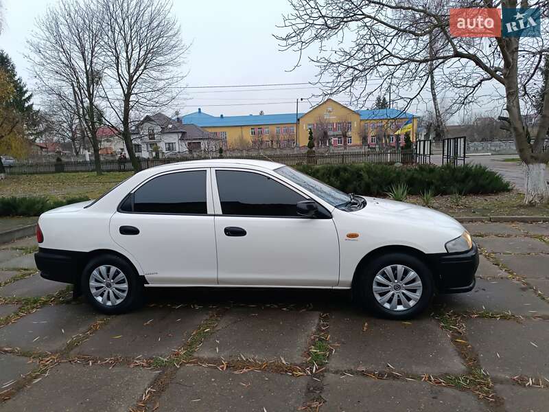 Седан Mazda 323 1998 в Чернівцях фото 8 Седан Mazda 323 1998 в Чернівцях