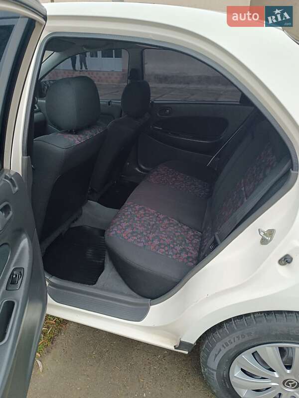 Седан Mazda 323 1998 в Чернівцях фото 23 Седан Mazda 323 1998 в Чернівцях