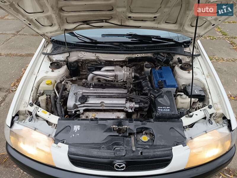 Седан Mazda 323 1998 в Чернівцях фото 30 Седан Mazda 323 1998 в Чернівцях