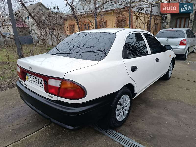 Седан Mazda 323 1998 в Чернівцях фото 41 Седан Mazda 323 1998 в Чернівцях