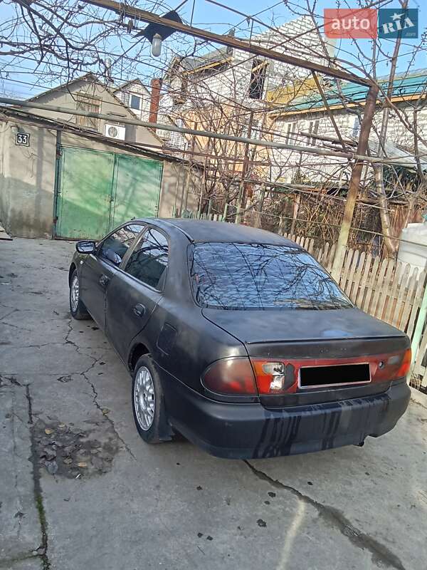 Седан Mazda 323 1995 в Одесі фото 7 Седан Mazda 323 1995 в Одесі