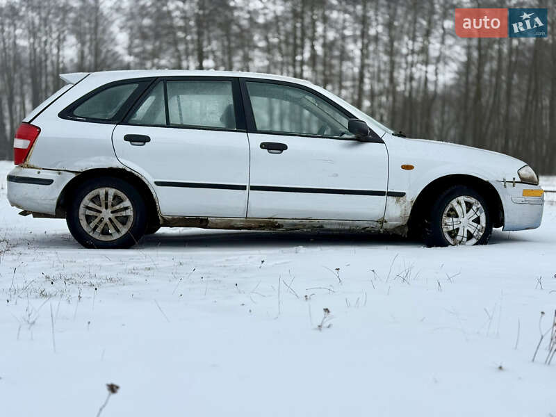 Хэтчбек Mazda 323 1999 в Калиновке фото 9 Хэтчбек Mazda 323 1999 в Калиновке