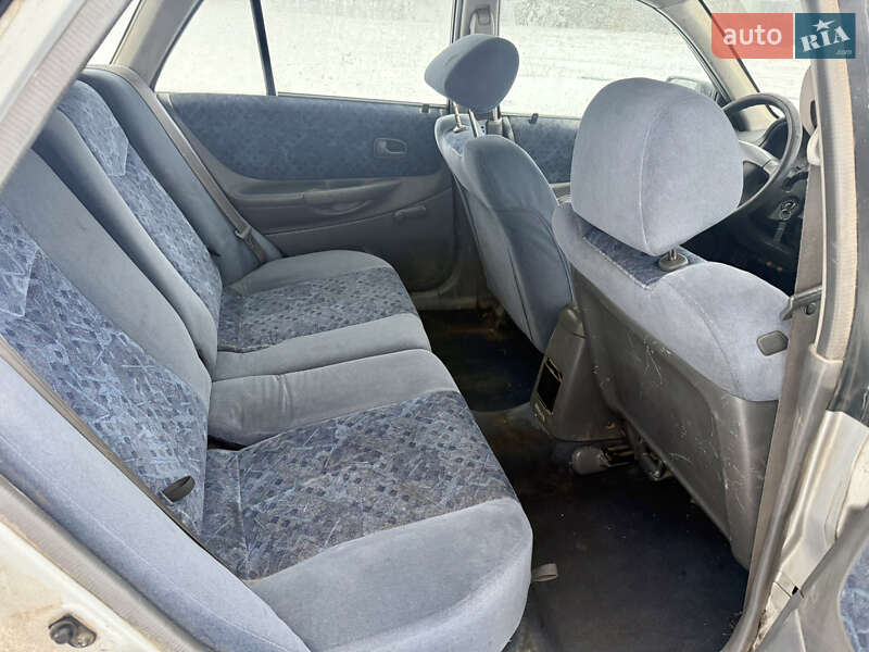 Хэтчбек Mazda 323 1999 в Калиновке фото 18 Хэтчбек Mazda 323 1999 в Калиновке