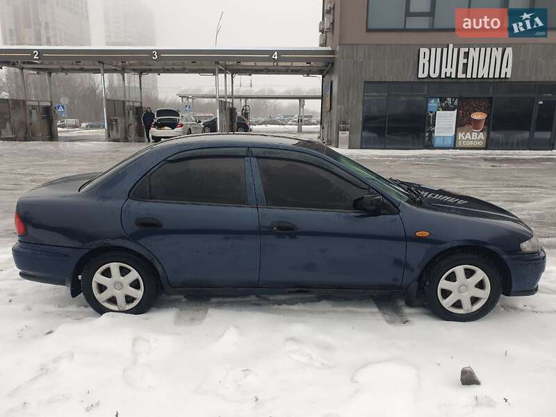 Седан Mazda 323 1998 в Киеве фото 18 Седан Mazda 323 1998 в Киеве