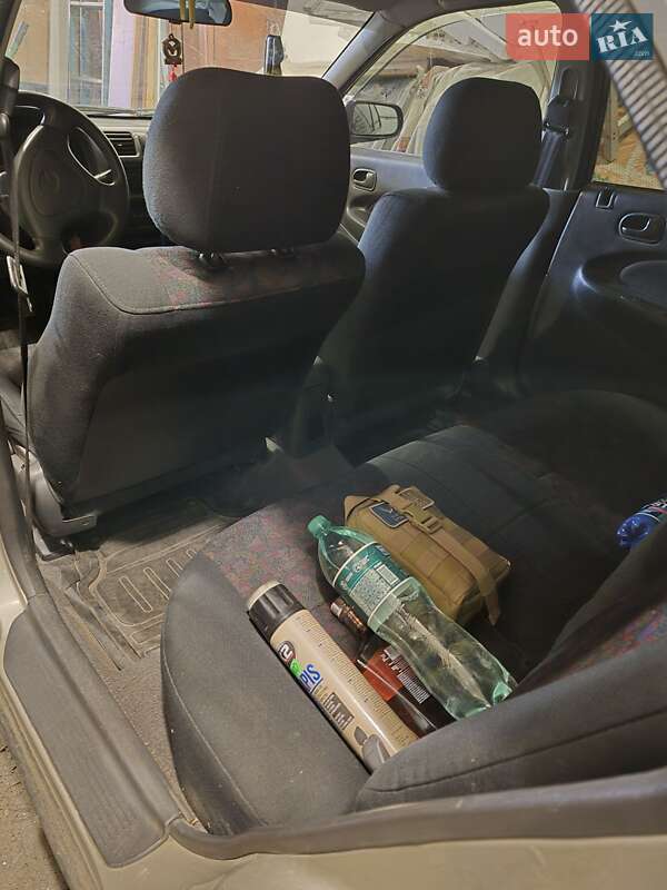 Седан Mazda 323 1998 в Славянске фото 6 Седан Mazda 323 1998 в Славянске