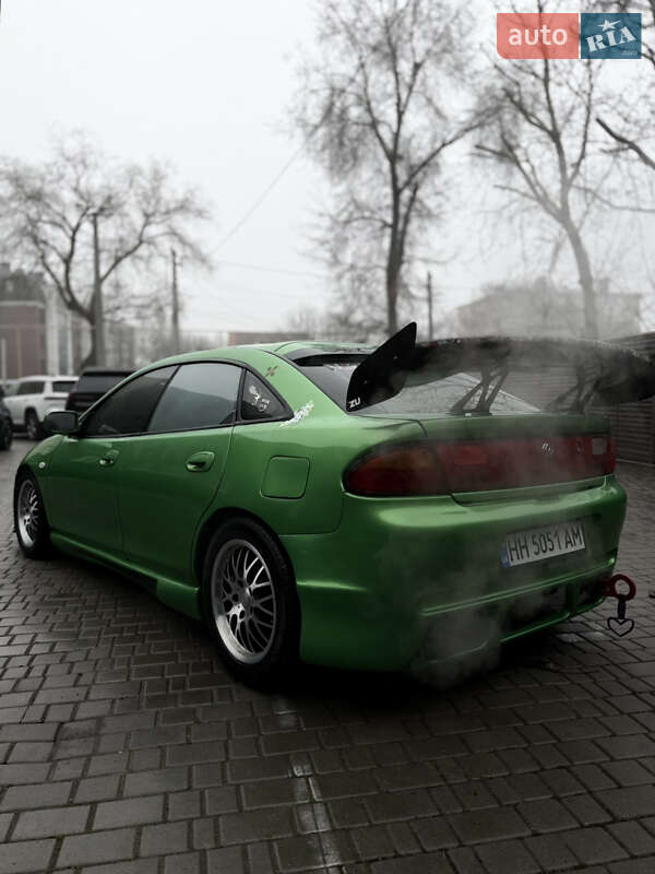 Седан Mazda 323 1994 в Одесі фото 4 Седан Mazda 323 1994 в Одесі