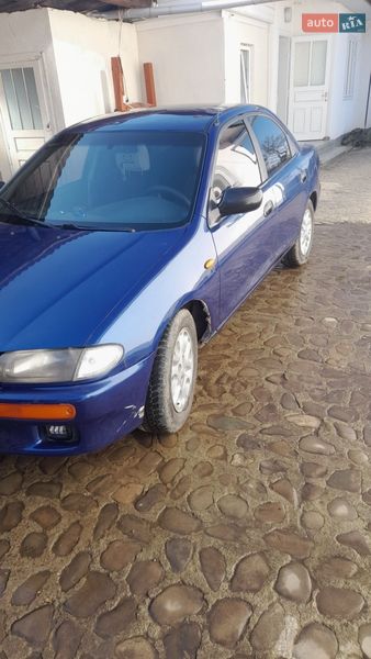 Седан Mazda 323 1996 в Косові