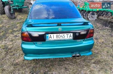 Седан Mazda 323 1995 в Узине