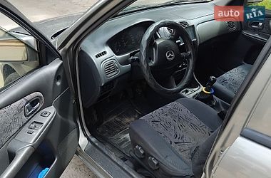 Хэтчбек Mazda 323 1999 в Затишье фото 4 Хэтчбек Mazda 323 1999 в Затишье
