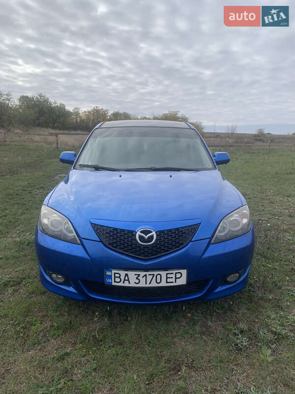 Хэтчбек Mazda 3 2004 в  фото Хэтчбек Mazda 3 2004 в