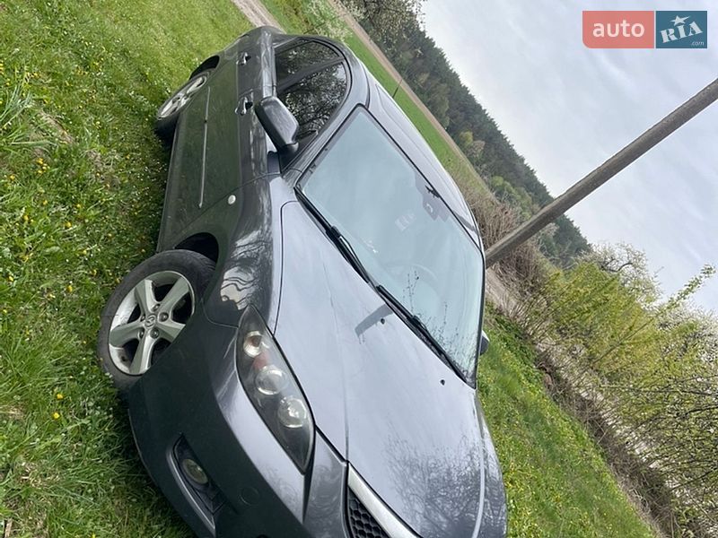 2007 Mazda 3, VIN JM7BK326671322691:plate — фото 1 (autoria)