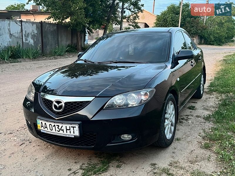 2008 Mazda 3, VIN JMZBK12F501799228:plate — photo 1 (autoria)