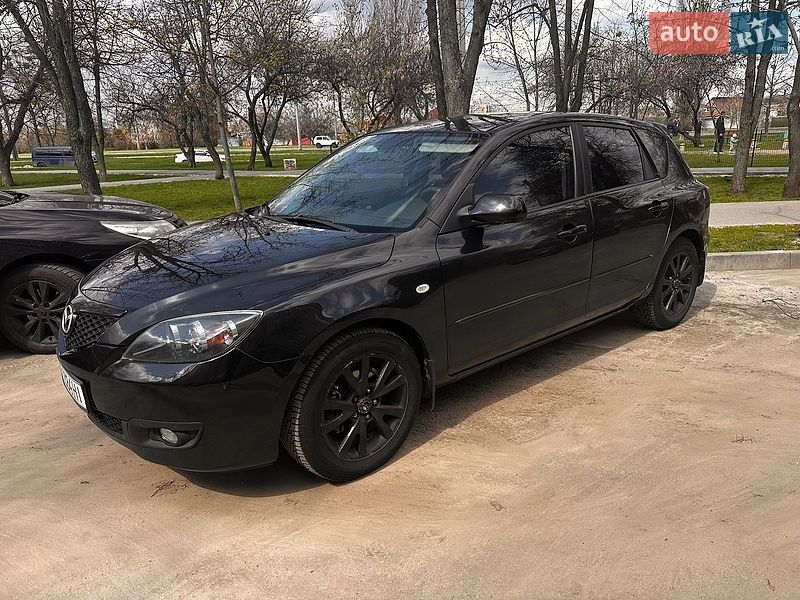 Mazda 3, photos from the listing