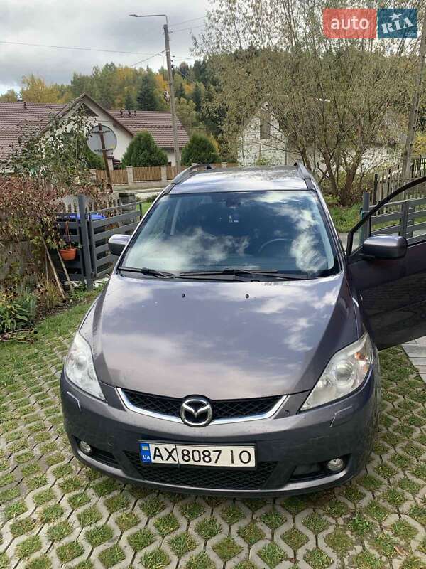 Минивэн Mazda 5 2006 в  фото Минивэн Mazda 5 2006 в