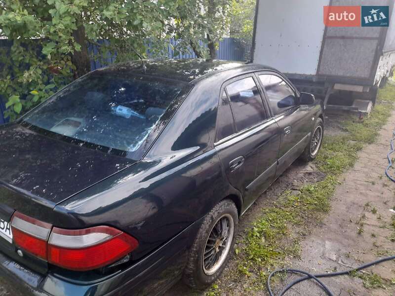 Хетчбек Mazda 626 1998 в Конотопі фото 7 Хетчбек Mazda 626 1998 в Конотопі