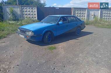 Купе Mazda 626 1987 в 
