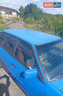 Купе Mazda 626 1987 в 