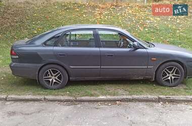 Хэтчбек Mazda 626 1999 в 