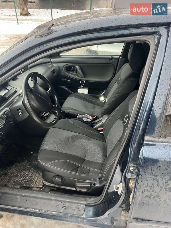 Хэтчбек Mazda 626 1997 в Павлограде фото 4 Хэтчбек Mazda 626 1997 в Павлограде