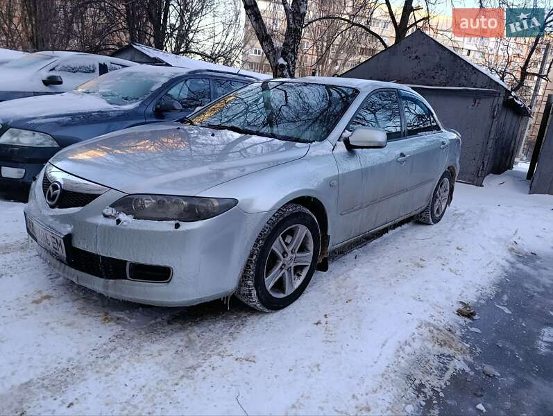 2006 Mazda 6, VIN JMZGG12F771687318:plate — фото 1 (autoria)