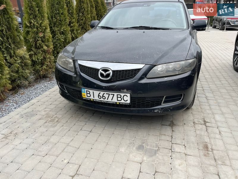 2006 Mazda 6, VIN JMZGG12F771674298:plate — фото 1 (autoria)