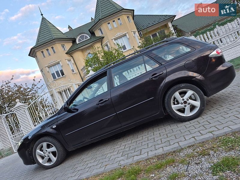 2005 Mazda 6, VIN JMZGY19R201207519:plate — фото 1 (autoria)