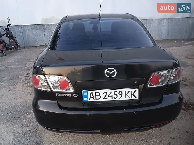 2005 Mazda 6, VIN JMZGG12F661608415:plate — photo 1 (autoria)