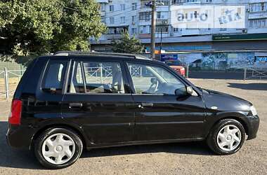 Хэтчбек Mazda Demio 2002 в 