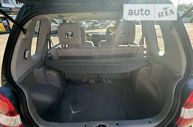 Хэтчбек Mazda Demio 2002 в 