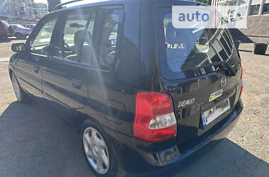 Хэтчбек Mazda Demio 2002 в 