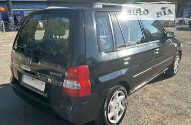 Хэтчбек Mazda Demio 2002 в 