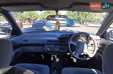 Седан Mazda Persona 1989 в 