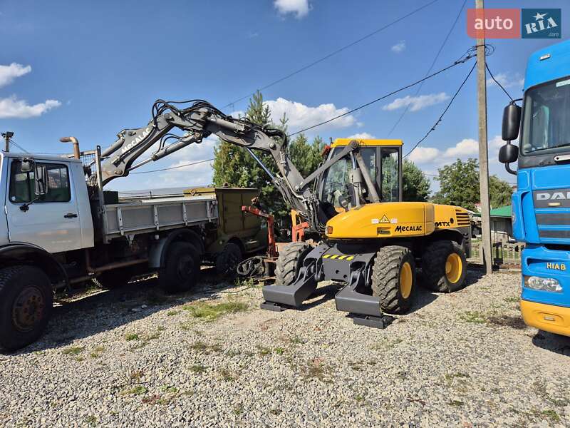 Колесный экскаватор Mecalac 12MXT 2011 в Бучаче фото 9 Колесный экскаватор Mecalac 12MXT 2011 в Бучаче