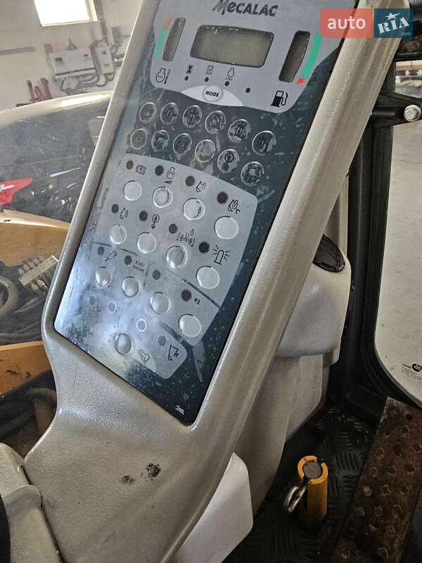 Колесный экскаватор Mecalac 12MXT 2011 в Бучаче фото 14 Колесный экскаватор Mecalac 12MXT 2011 в Бучаче