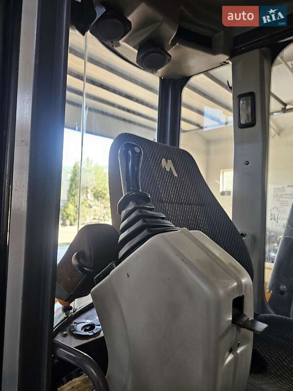 Колесный экскаватор Mecalac 12MXT 2011 в Бучаче фото 18 Колесный экскаватор Mecalac 12MXT 2011 в Бучаче