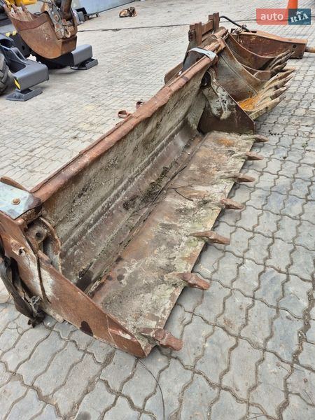 Колесный экскаватор Mecalac 12MXT 2011 в Бучаче