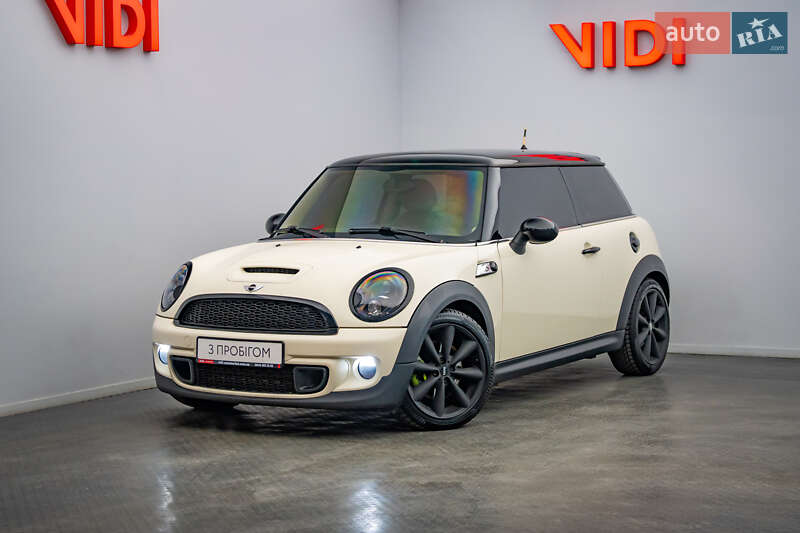 2010 Mini Cooper, VIN WMWSV31040TY65950:plate — photo 1 (autoria)