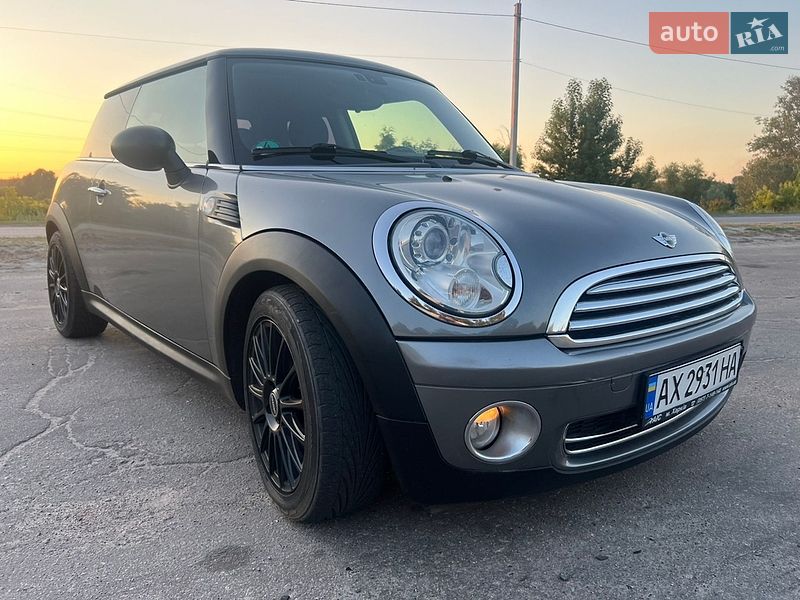 2010 Mini Cooper, VIN WMWSR31020TN94133:plate — фото 1 (autoria)