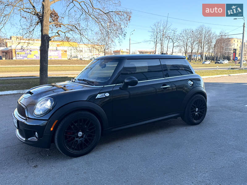 2010 Mini Hatch, VIN WMWMF7100ATZ84299:plate — фото 1 (autoria)