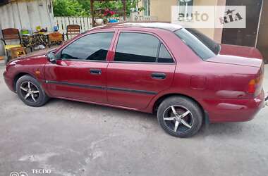 Седан Mitsubishi Carisma 1998 в Обухове