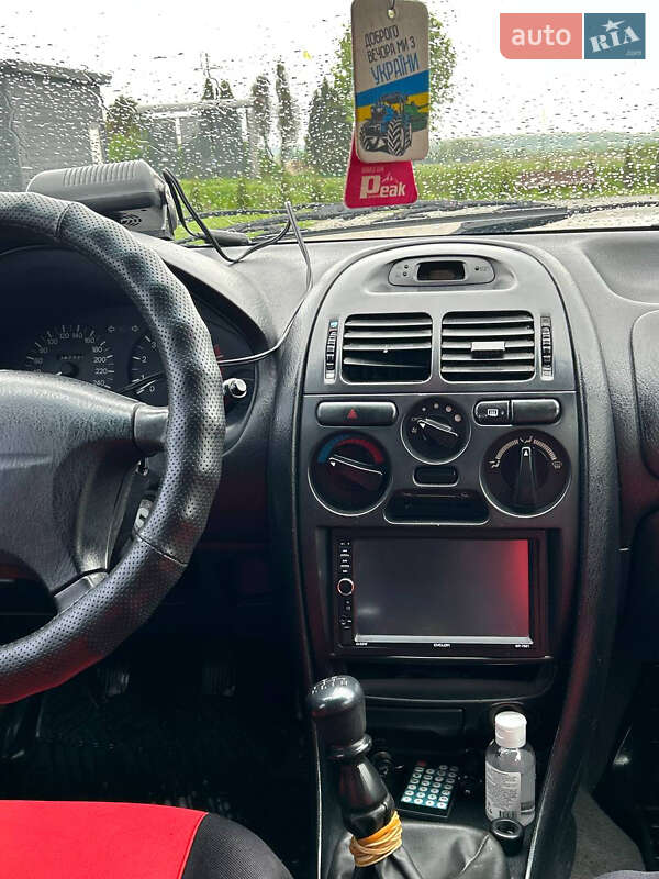 Ліфтбек Mitsubishi Carisma 1996 в Городку фото 14 Ліфтбек Mitsubishi Carisma 1996 в Городку