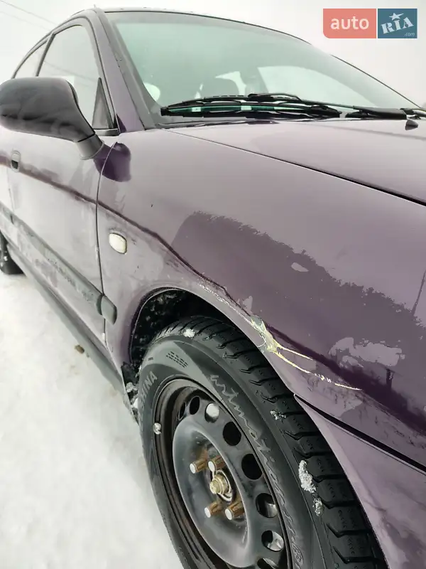 Mitsubishi Carisma 2002 VIN XMCLNDA1A2F004900 фото оголошення 8 з 42