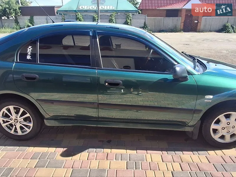 Mitsubishi Carisma 2000 VIN XMCLNDA2AYF018052 фото оголошення 4 з 42