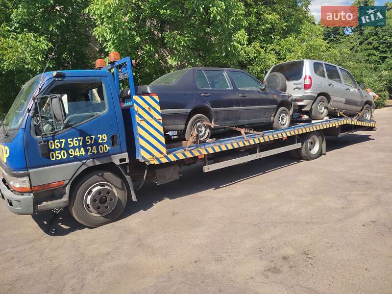 Эвакуатор Mitsubishi Fuso Canter 1999 в Новомосковске