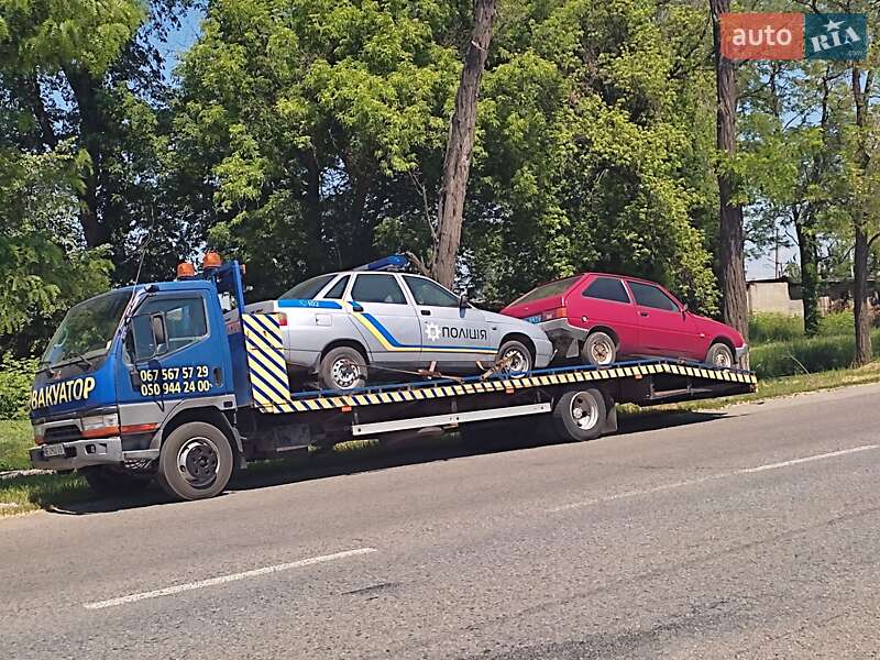 Эвакуатор Mitsubishi Fuso Canter 1999 в Новомосковске