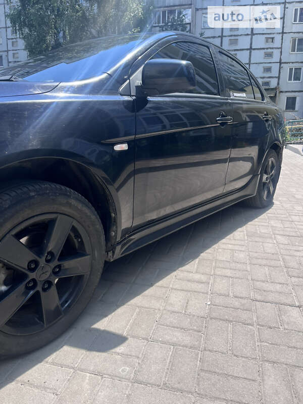 Седан Mitsubishi Lancer 2008 в Ромнах