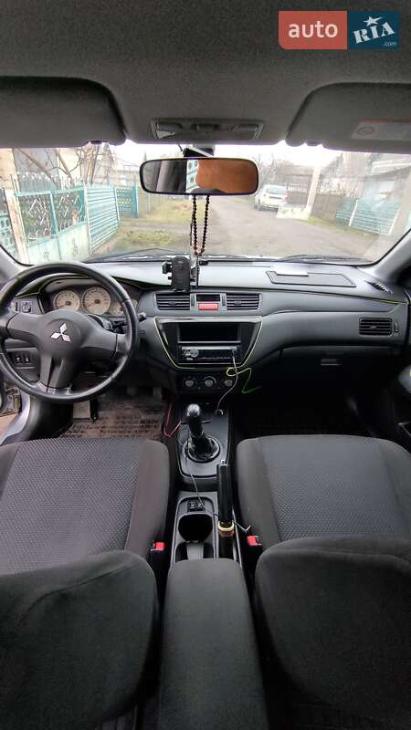 Седан Mitsubishi Lancer 2006 в Раздельной